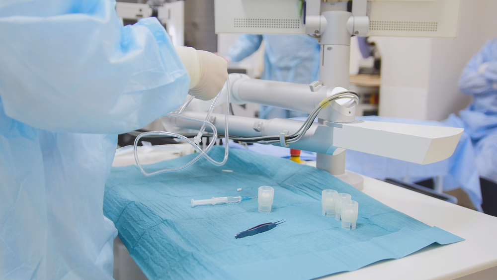 Surgeons preparing in operating room