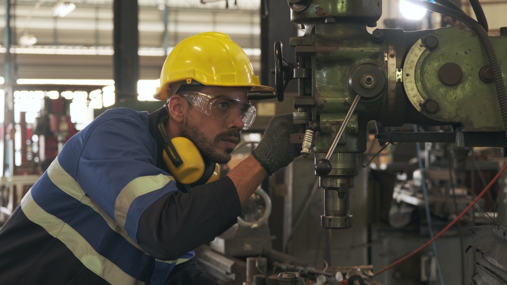 Machinist evaluates factory tools