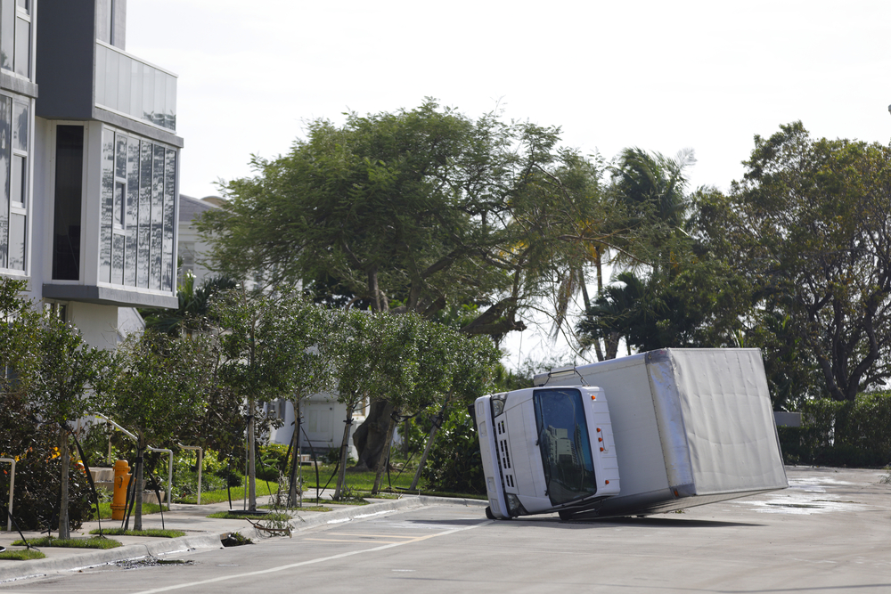 Rollover of a box truck on a Miami-area street
